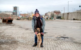 man with dog liverpool docks