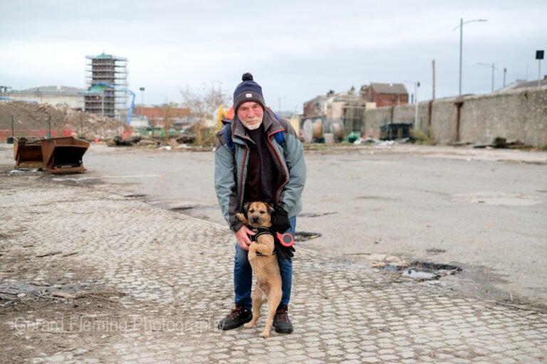 man with dog liverpool docks